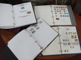 Stamps; A collection of world stamps, early to modern, housed in two, four ring binders and two