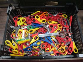 A Selection of multi-coloured handled childrens scissors.