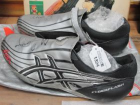Athletics - Colin Jackson, pair of Asics Cyberflash Size 10½ Running Shoes in silver and black,