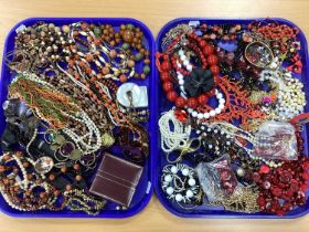 A Quantity of Assorted Costume Jewellery, to include gilt coloured necklaces, knotted glass