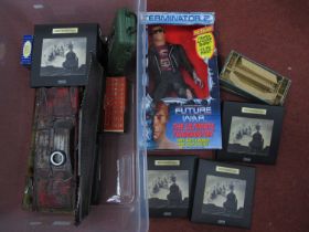 A boxed Kenner Terminator 2 plastic action figure, Hornby Dublo D1 Footbridge, D2 Signals, Atlas