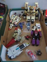 A collection of predominantly circa 1980's G1 Transformers including Bandai Jet Fire Autobot,