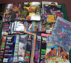 Wrestling Magazines; WWE Collectors Series, approximately thirty-six, two official annuals and a