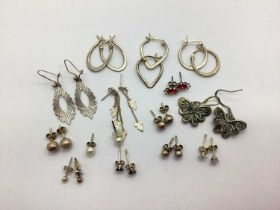 A Small Collection of Earrings to include various shaped hoop earrings stamped "STERLING", drop