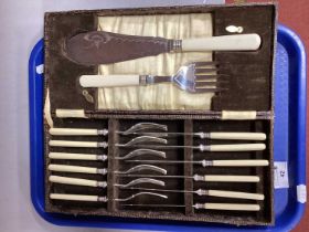 A Cased Set of Fish Knives and Forks, with hallmarked silver ferrules, complete with matching