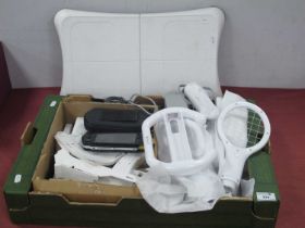 A Nintendo Wii Gaming Console, Wii Balance Board and accessories, together with a Sony PSP (