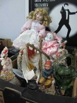 Doll with a porcelain head, Leonardo figures, green glass vase etc :- One box.