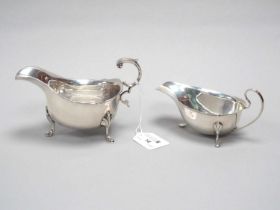 A Hallmarked Silver Sauce Boat, JD&S, Sheffield 1929, with wavy edge and flying scroll handle, on