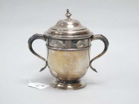 A Hallmarked Silver Twin Handled Lidded Trophy Cup, JW&T, London 1911, engraved "Royal International