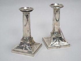 A Pair of Hallmarked Silver Candlesticks, Mappin & Webb, London 1904 (marks rubbed), each with