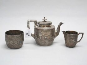 A Victorian Scottish Hallmarked Silver Three Piece Tea Set, RS, Glasgow 1897, each allover profusely