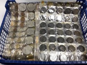 Large Collection Of GB And World Circulated Coinage, in twenty-one plastic coin sheets.