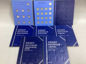 Collection Of Seven Whitman Coin Folders, including Silver Threepence and Sixpences, Pennies,