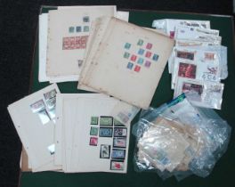 Stamps; An accumulation of World and Great Britain stamps, early to modern, in packets and on