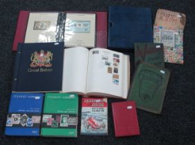 Stamps; A collection of World stamps housed in junior and stock, book includes an empty stock book