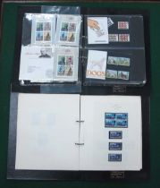 Stamps; Two albums containing stamps and first-day covers, ranging from Queen Elizabeth II pre-