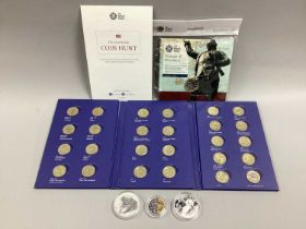 2010 Australia 1oz Fine Silver One Dollar, together with a Royal Mint UK £1 coin hunt folder