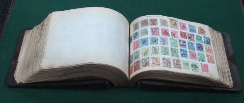Stamps; An Early Worldwide Stamp Collection (No British Commonwealth), housed in an old Ledger-