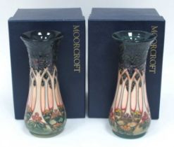 A Pair of Moorcroft Pottery Vases, of waisted cylindrical form, in the 'Cluny' pattern, painted