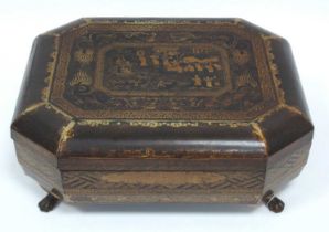 A Japanese Lacquer Late XIX Century Black and Gilt Gaming Box and Cover, of canted rectangular