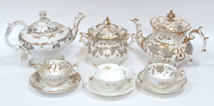 A Rockingham Porcelain Teapot and Cover and Matching Sucrier and Cover, with crown finials,