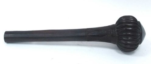 A Good Heavy Fijian Throwing Club, with carved diamond shaped panels and fluted top, 47cm long.