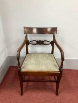 A XIX Century Mahogany Carver Chair, with rectangular top rail, shaped arms and drop-in seat, on