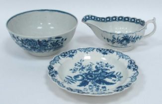 A Worcester Porcelain Sauce Boat, of fluted oval form, painted in underglaze blue with floral sprays