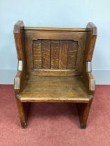 A XX Century Oak Bench, with panelled back and solid seat, shaped sides, 92cm high, 62cm wide.