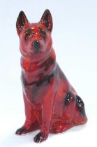 An Anita Harris Pottery Flambé Model of a German Shepherd Dog, gold signed to base, 12.5cm high.