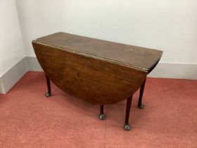 A Mid XVIII Century Mahogany Pad Foot Table, with drop leaves and single drawer on round tapering