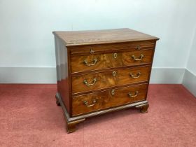 An XVIII Century Chest of Drawers, the top with moulded edge above brushing slide over three long