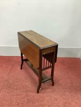 An Edwardian Inlaid Mahogany Sutherland Table, the drop leaves with crossbanded edge on shaped