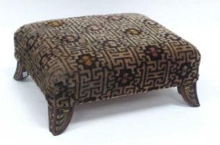 A Late XIX Century Rectangular Footstool, raised on splayed mahogany feet applied with brass