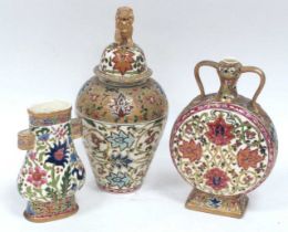 A Hungarian Fischer Pottery Two-Handled Flask, elaborately decorated with an all-over floral and