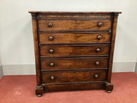 A XIX Century Mahogany Chest of Drawers, with four long drawers, column supports on plinth base,