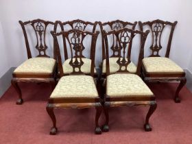A Set of Six XVIII Century Style Dining Chairs, with shaped top rails and drop-in seats on carved