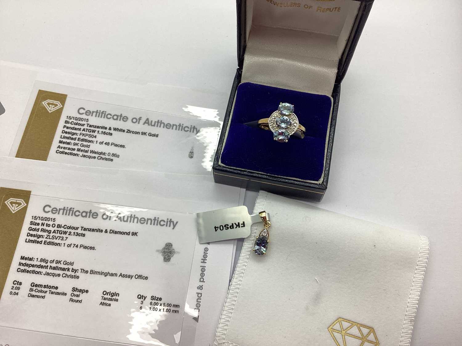 The Genuine Gemstone Company Ltd; A 9ct Gold Bi-Colour Tanzanite and Diamond Ring, the claw set