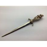 A Decorative Novelty Figural Dagger Letter Opener, the handle as three figures in period dress, a