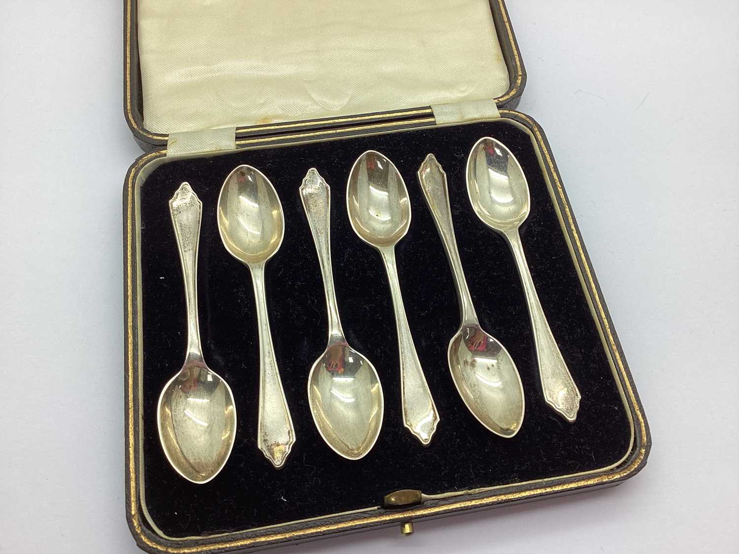 A Set of Six Hallmarked Silver Coffee Spoons, in original fitted case.