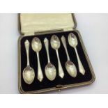 A Set of Six Hallmarked Silver Coffee Spoons, in original fitted case.