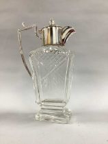 A Decorative Plated Mounted Cut Glass Jug, with angular handle and hinged lid, overall height 24.
