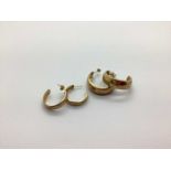 A Pair of 9ct Gold Half Hoop Earrings, of etched scrolled design, together with another pair of hoop