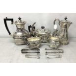 A Four Piece EPNS Tea Set, each with gadrooned detail, raised on bun feet; together with a pair of
