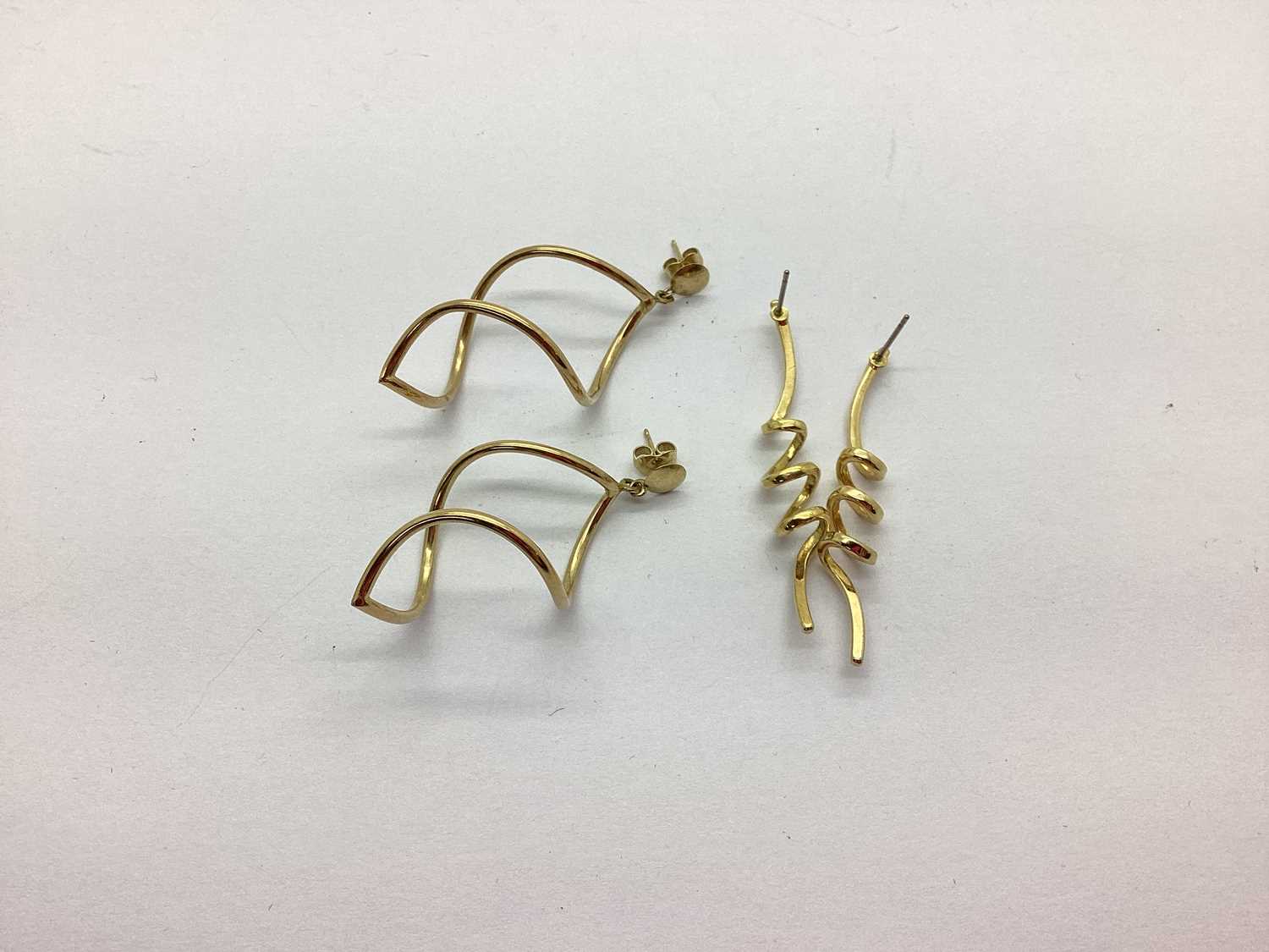 A Pair of 9ct Gold Drop Earrings, of open spiral design, together with a pair of twist drop