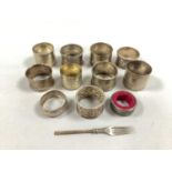 A Collection of Hallmarked Silver and Other Napkin Rings, (some initialled) a wine bottle drip ring,