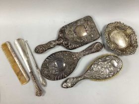 Decorative Hallmarked Silver Backed Brushes, a decorative hand mirror (damages); pierced oval