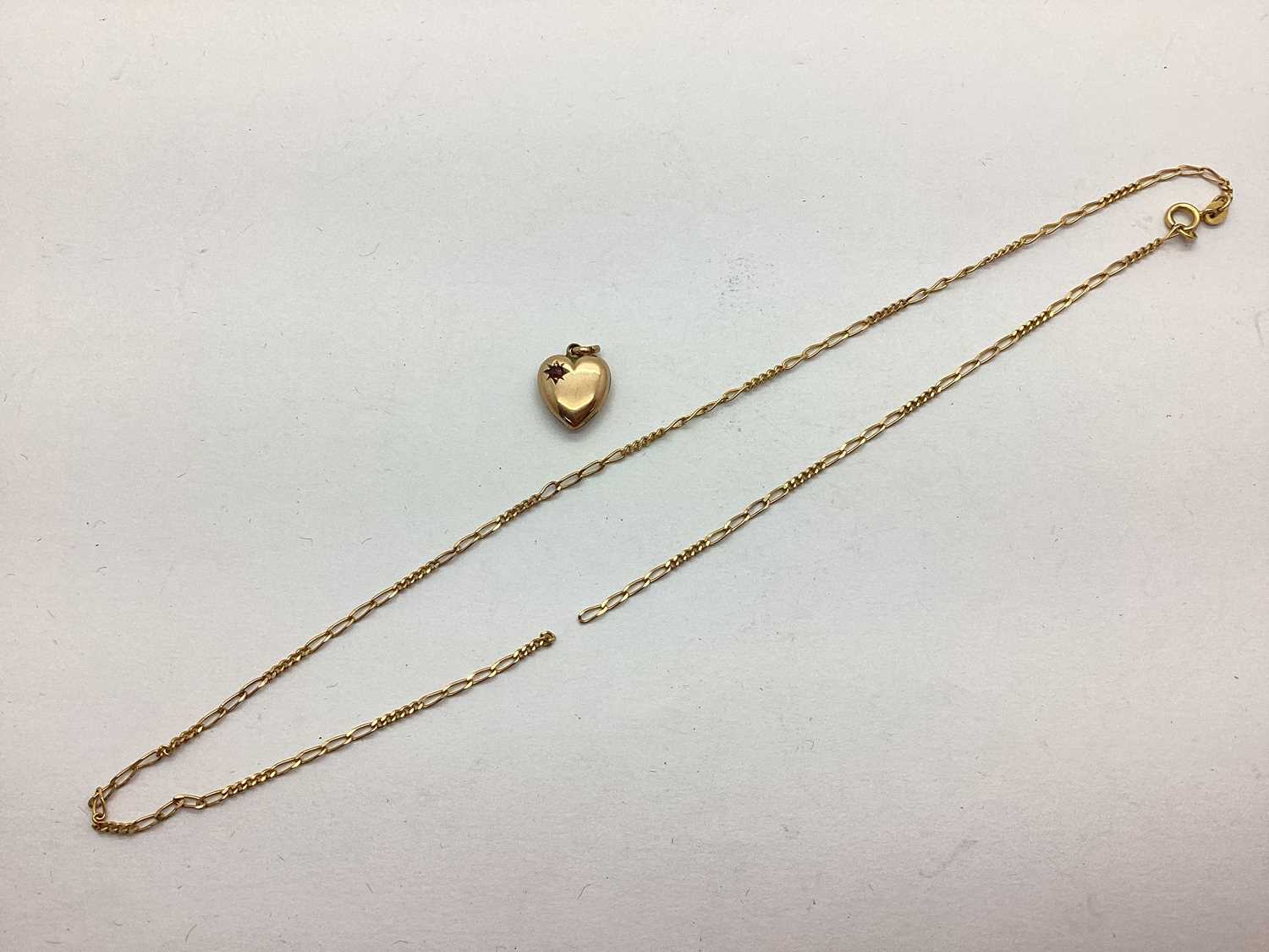 A 9ct Gold Dainty Figaro Link Chain (broken); together with a 9ct gold heart-shaped pendant, the