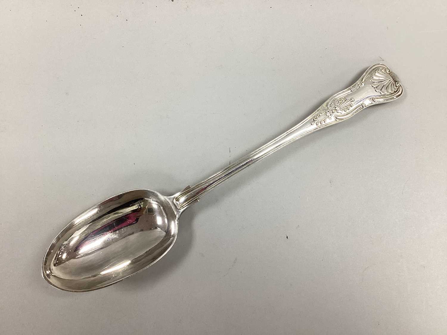 A Victorian Hallmarked Silver Kings Pattern Basting Spoon, FH, London 1897, the handle double