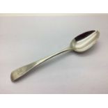 A Hallmarked Silver Old English Pattern Table Spoon, initialled (60grams).